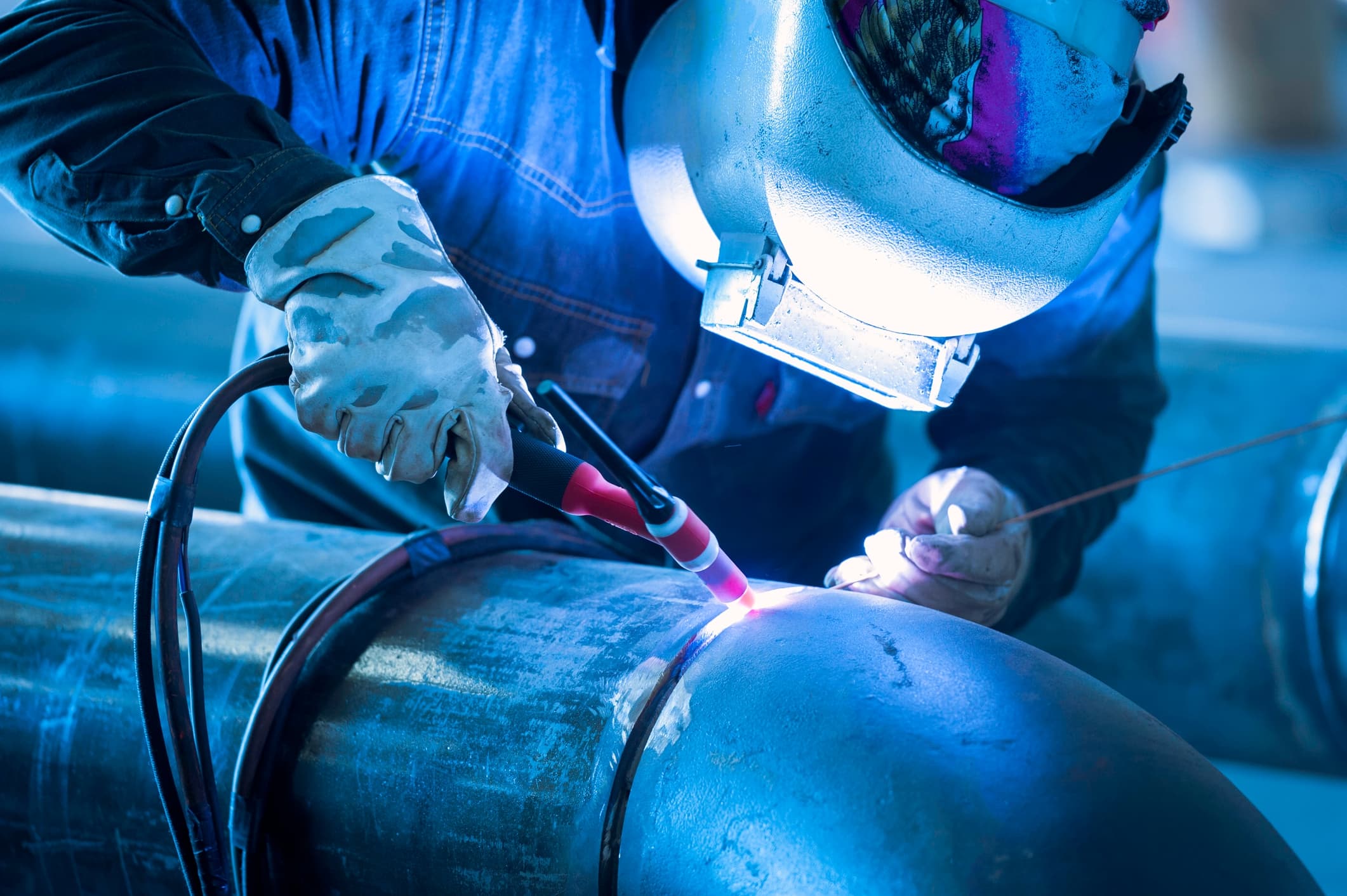 welder-welding-metal-piping-tig-protective-gear-maintance-construction-torch.jpg