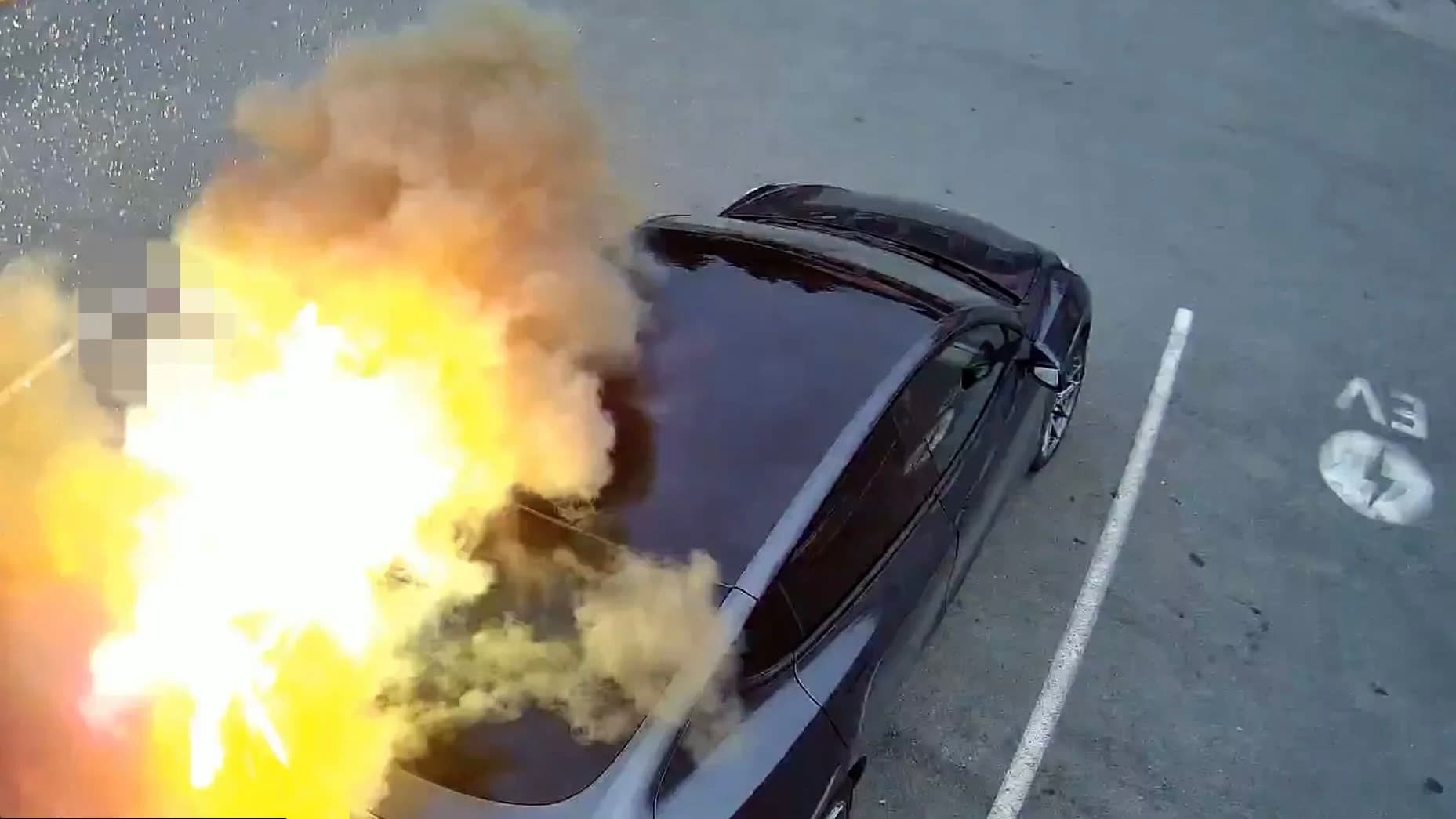 Security camera footage of an EV on fire